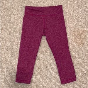 Magenta Under Armour crop leggings.